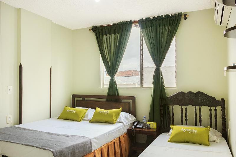 Ayenda 1506 La Puerta Del Sol Hotell Bucaramanga Rum bild